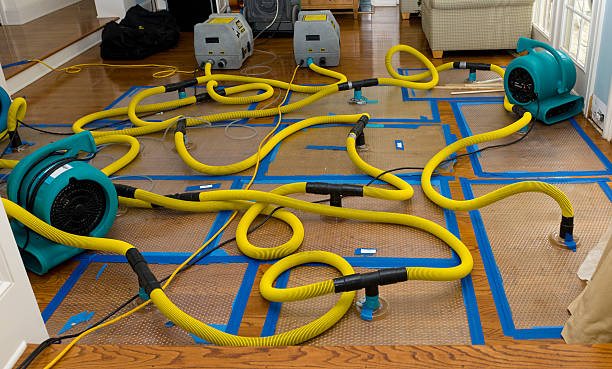 Professional Flood Damage Restoration technician working in Schaumburg, IL